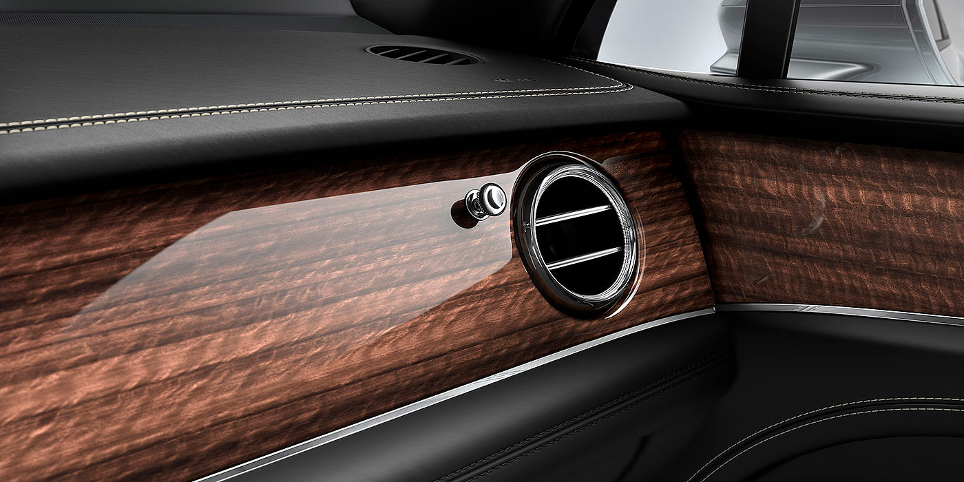 Bentley - Nanchang Bentley Bentayga front interior Crown Cut Walnut veneer and chrome air vent.
