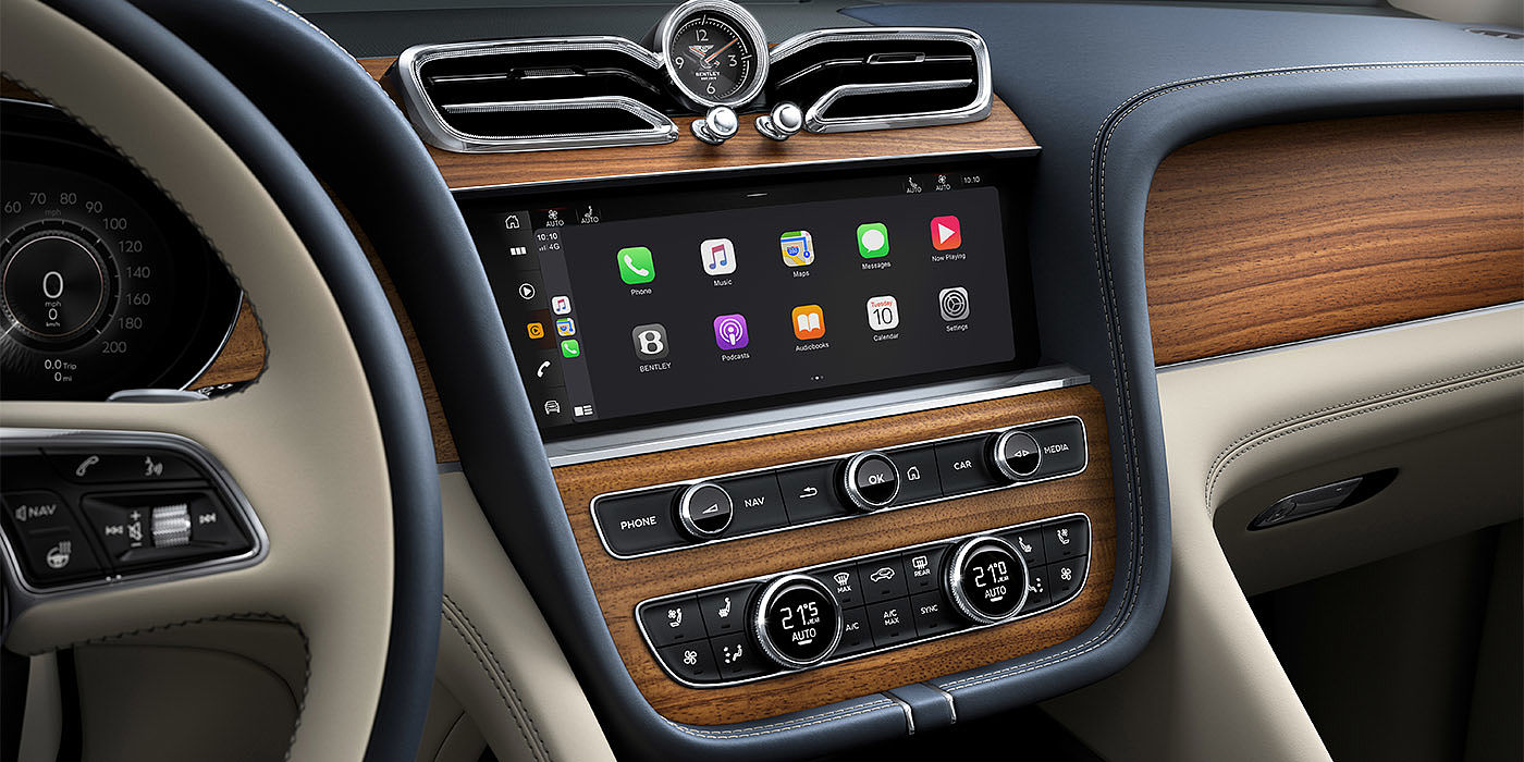 Bentley - Nanchang Bentley Bentayga EWB Azure dashboard in Open Pore Koa veneer featuring multimedia screen and climate control console.